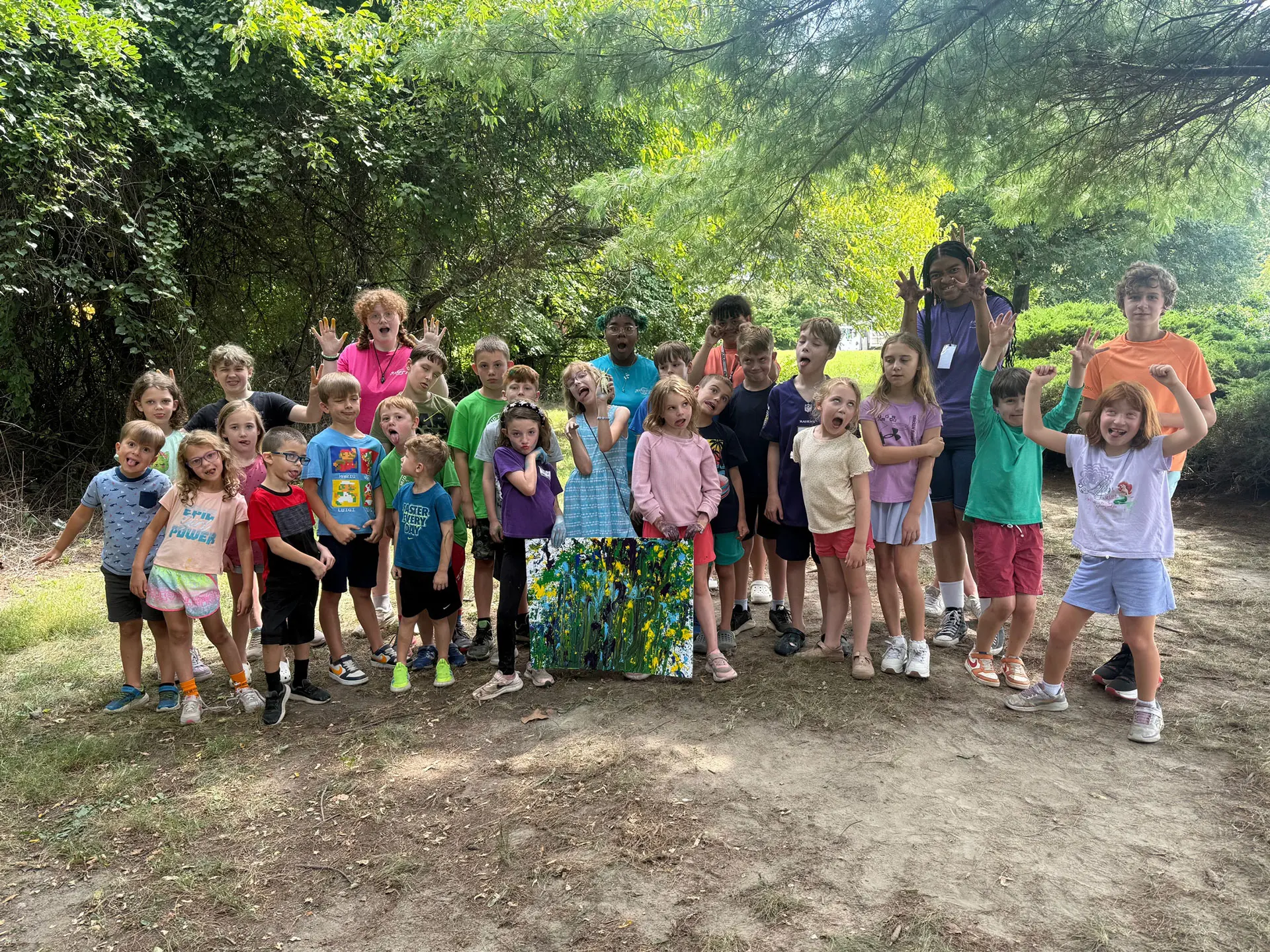 Kids cheering at summer camp