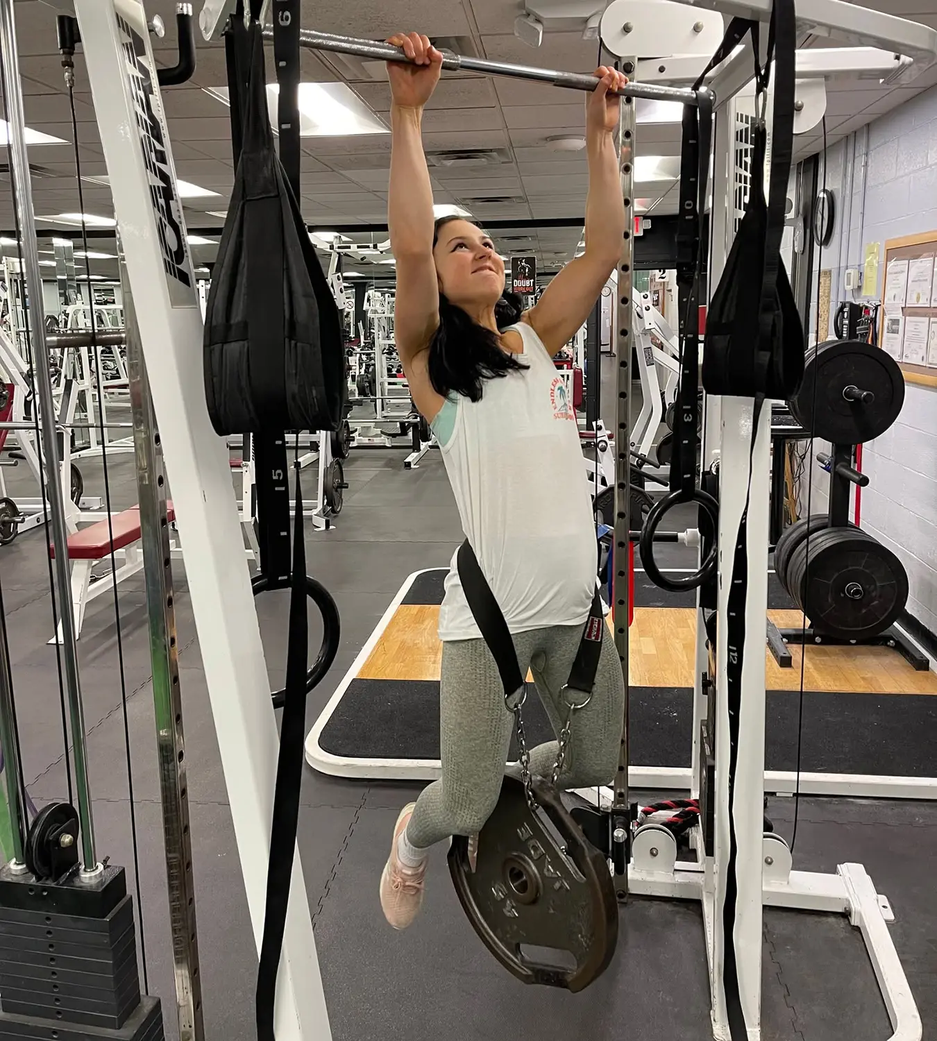 A woman circuit training in the gym